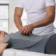 Woman receiving a chiropractic adjustment