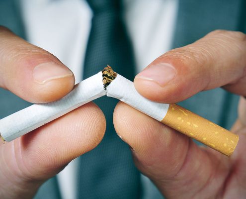 A cigarette broken in half