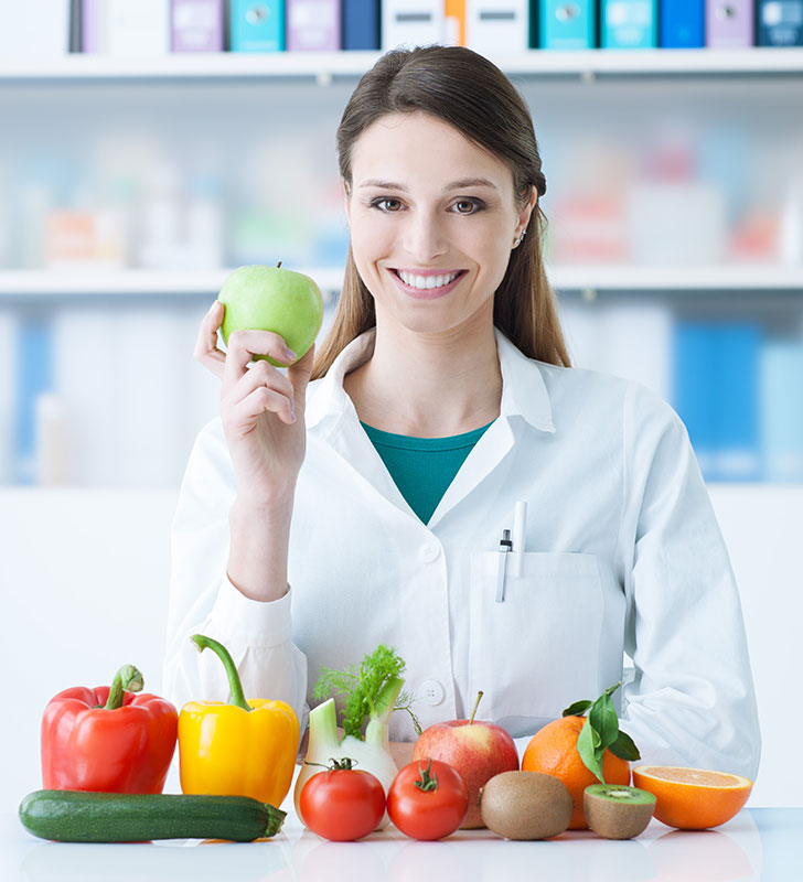 Nutritionist with Fruits and Vegetables Nutritionist with Fruits and Vegetables